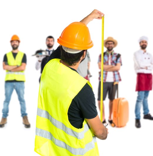 Workman with meter over white background